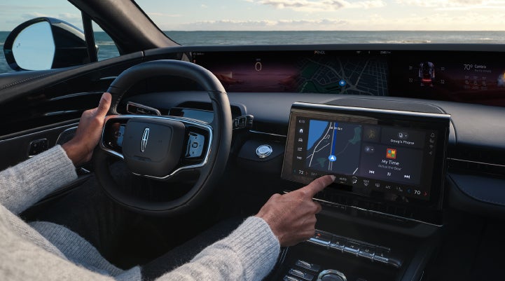 The driver of a 2024 Lincoln Nautilus® SUV interacts with the new Lincoln Digital Experience. | Lincoln of Cutler Bay in Miami FL