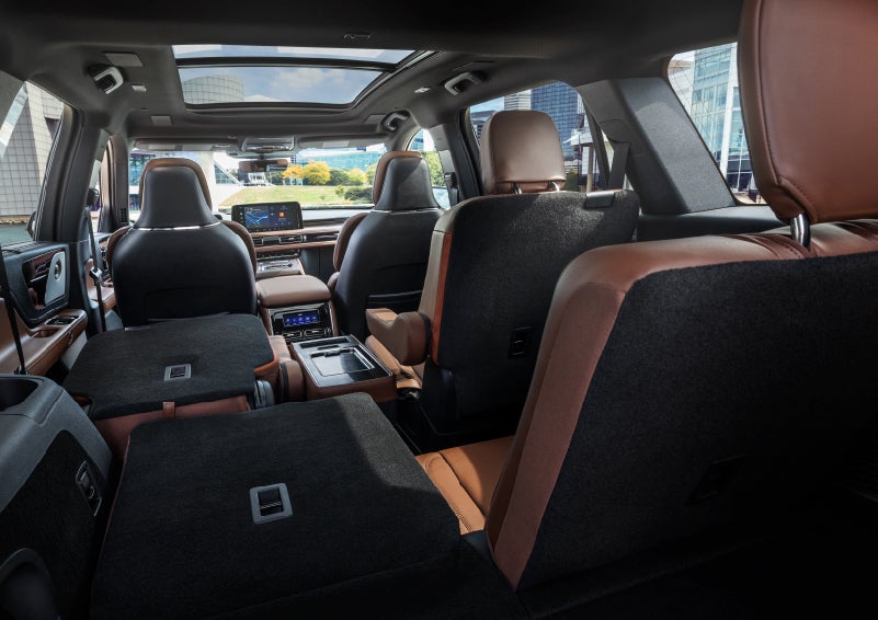 The interior of the 2025 Lincoln Aviator® SUV is shown with two seats folded down for added space. | Lincoln of Cutler Bay in Miami FL