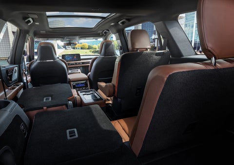 The interior of the 2025 Lincoln Aviator® SUV is shown with two seats folded down for added space. | Lincoln of Cutler Bay in Miami FL