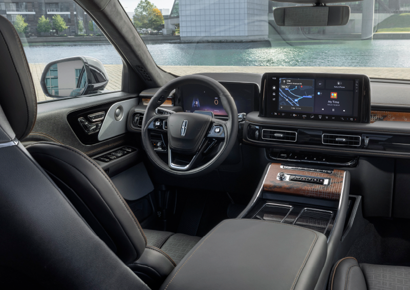 The interior of the 2025 Lincoln Aviator® SUV is shown parked with a view of a harbor through the windshield. | Lincoln of Cutler Bay in Miami FL